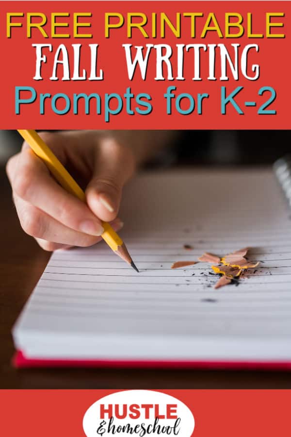 Free Printable Fall Writing Prompts for K-2 Homeschoolers text overlay on picture of hand holding pencil and notebook